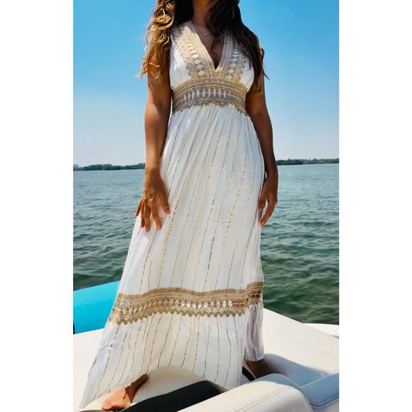 Elegant Long White Dress with Gold Accents and Braided Rope Detailing - Picture 2 of 4